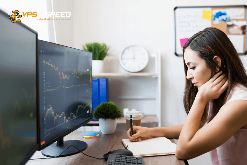 Forex trader studying market charts on a computer screen and recording observations during trading analysis